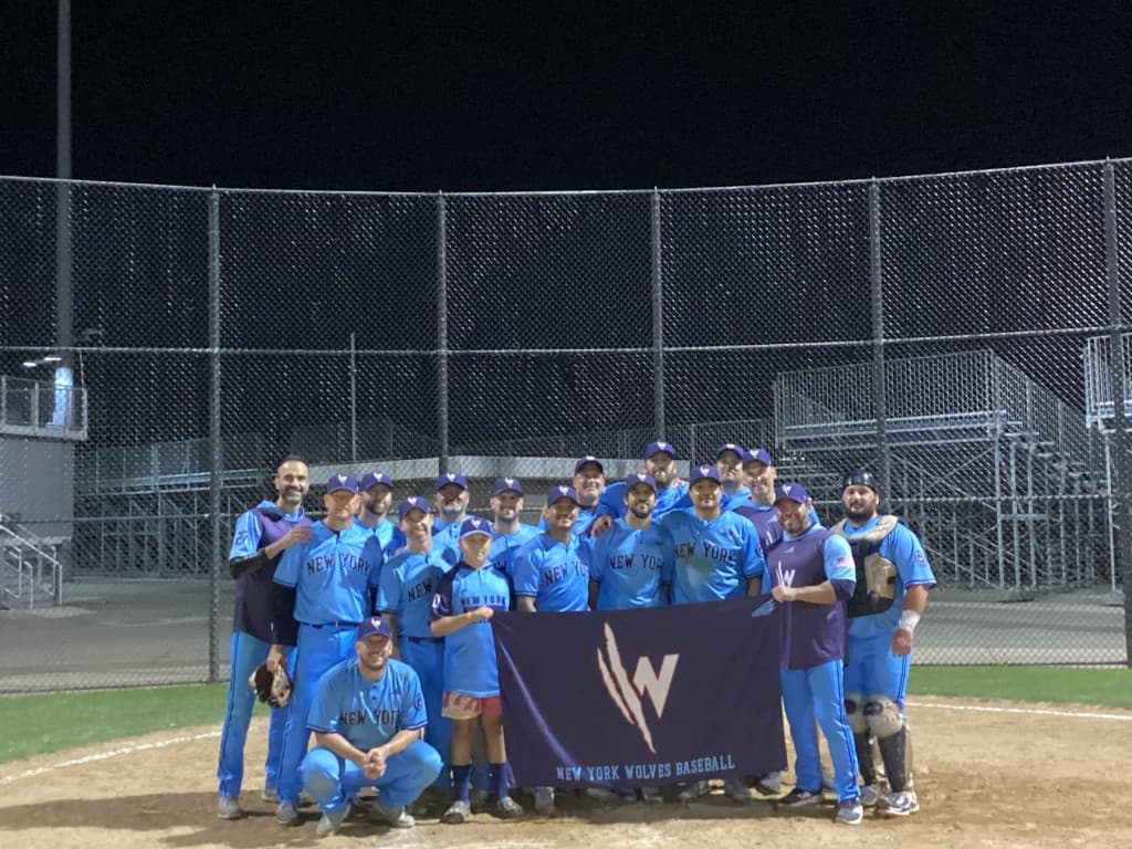 New York Wolves 2025 championship team photo on the field at night
